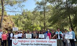 Köyceğiz’de sağlıkçılar Toparlar Şelalesi’ne yürüdü