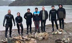 Yağmur altında deniz dibi temizliği