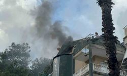 Marmaris'te çatı katı yangını: Mahsur kalan bir kişi kurtarıldı