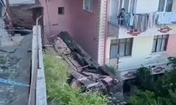 Çöken istinat duvarı binada hasar oluşturdu