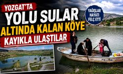 Yozgat'ta yolu sular altında kaln köye kayıkla ulaştılar