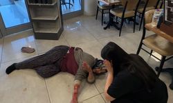 Tekmelere aldırmayan köpek kadının kolunu kopardı