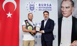 Başkan Vekili Biba'dan dünya şampiyonu güreşçiye tebrik