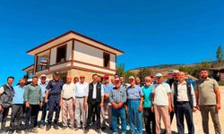 Kaymakam Titiz yangın bölgesinde yapımı süren konutları inceledi