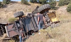 Park halindeyken hareket eden biçerdöver dereye devrildi