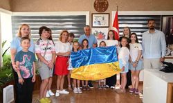 Ukraynalı çocuklar Kemer'de moral depoladı