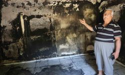 Yaşlı çiftin alevlere teslim olan 40 yıllık evlerinden geriye camı renklendiren çiçekleri kaldı