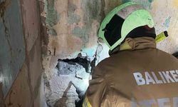 Erdek'te iki bina arasına sıkışan yavru kedi kurtarıldı