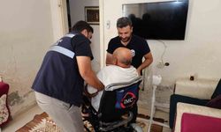 HBB' den Reyhanlı'da yaşayan engelli vatandaşa akülü tekerlekli sandalye desteği