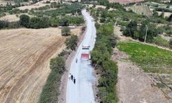 Manisa'da 1999'da açılan yol 27 yıl sonra asfaltla buluştu