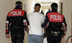 Manisa'da 152 yıl hapis cezasıyla aranan 17 yaşındaki şüpheli parkta yakalandı