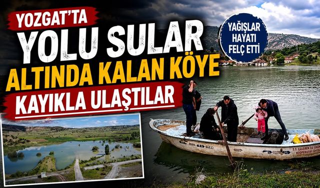 Yozgat'ta yolu sular altında kaln köye kayıkla ulaştılar