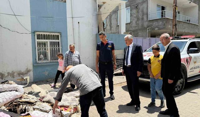 Başkan Hallaç, yangın mağduru aileyi yalnız bırakmadı